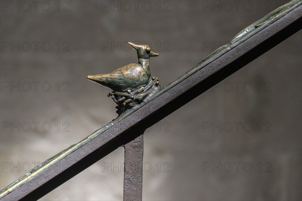 Metal figures on the banister leading to the gallery in Naumburg Cathedral, Saxony-Anhalt, Germany,