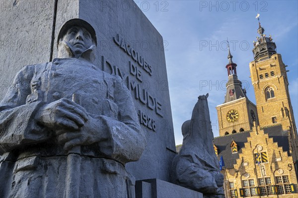 Detail of statue Jacques de Dixmude showing Belgian WWI soldier on Market square with town hall and