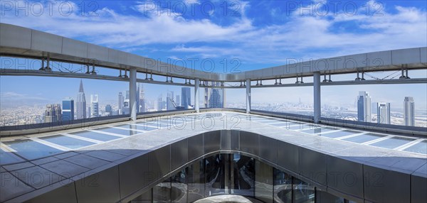 UAE, Skywalk Sky Views observation deck. Dubai panoramic skylineof city downtown and Dubai Mall.