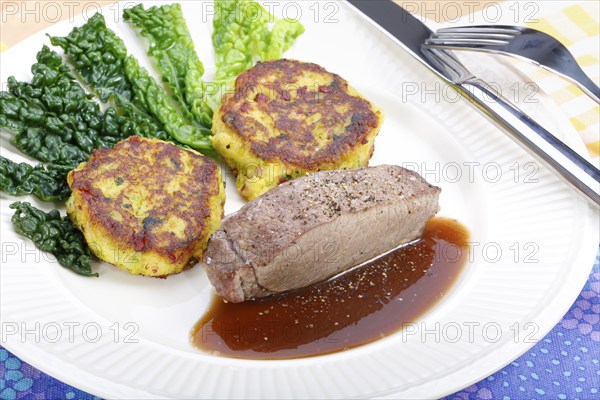 Swabian cuisine, medallions of wild boar with savoy cabbage cakes, meat dish, roasted, hearty, home
