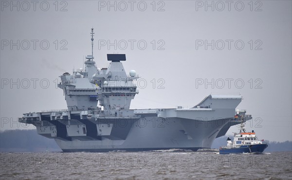 Aircraft carrier HMS Queen Elizabeth on the Elbe between Hamburg and the North Sea,