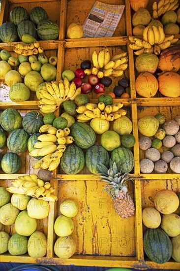 Fruit for sale in yellow bins, Sri Lanka, Asia