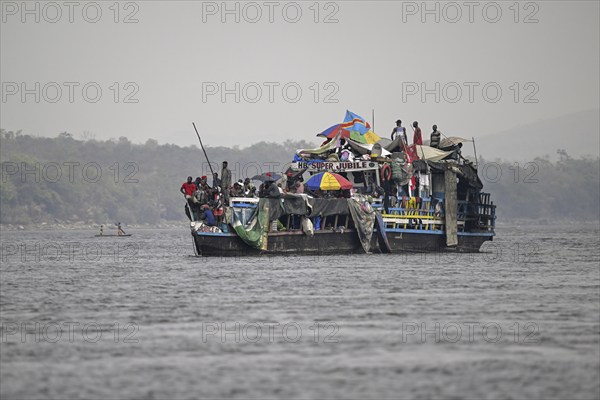 Overloaded ferry on the Congo River, near Tshumbiri, Mai-Ndombe Province, Democratic Republic of