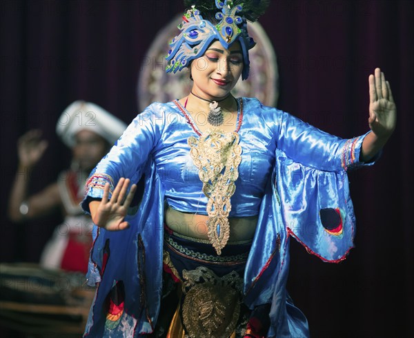 Sri Lankan dancer performing a traditional dance, Young Men's Buddhist Association, Kandy, Central