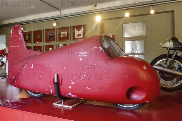 Record vehicle motorbike with red painted streamlined full fairing Model 75 Record from 1950s,