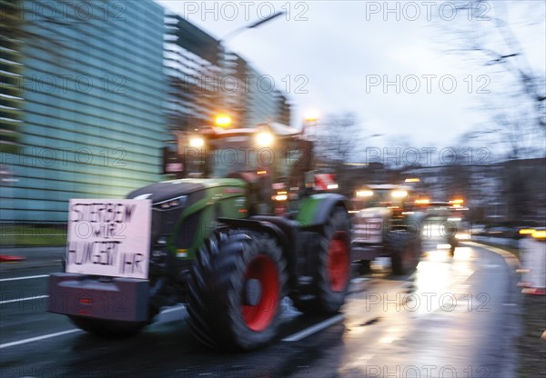 Thousands of farmers demonstrate with their tractors against the planned cancellation of the