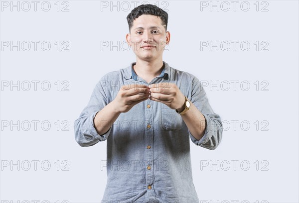 Person gesturing MORE in sign language isolated. Gesticulation of MORE in sign language. Deaf and