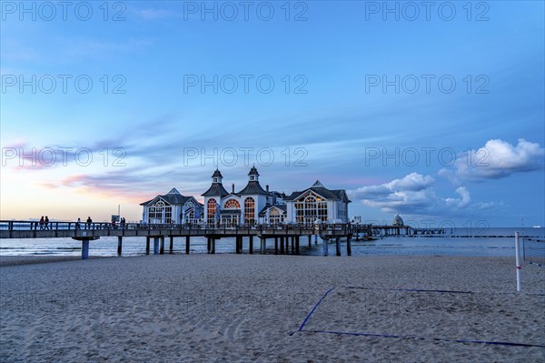 The pier of Sellin, evening mood, sunset, 394 metres long, with restaurant, jetty, beach chairs,