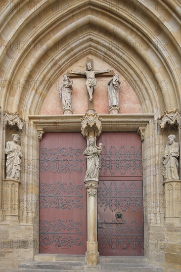 Portal with sculptures of Mary, Jesus on the cross and St John from the UNESCO Erfurt Cathedral,