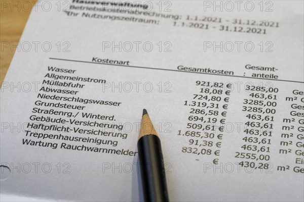Symbolic image of service charge statement, heating cost statement, rental costs, list of