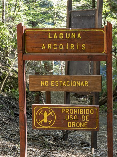 Information sign at the Laguna Arcoiris, drone use not allowed, parking forbidden sign, Conguillio