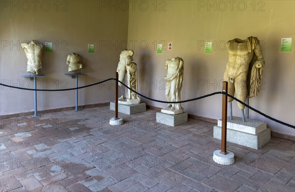 Classical period sculptures statues on display in archaeology museum, Apollonia Archaeological