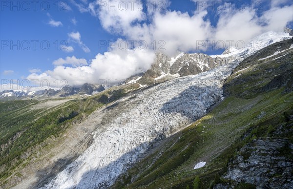 Mountain landscape with glacier Glacier des Bossons and summit of the Aiguille du Midi, Chamonix,