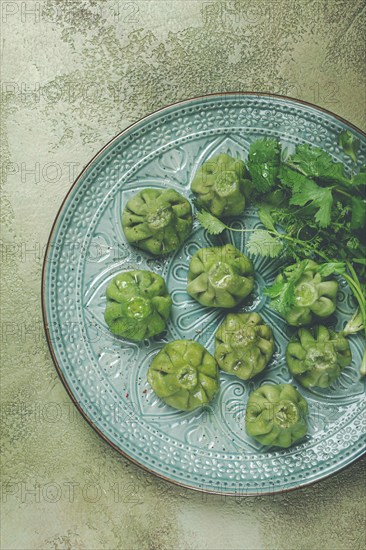 Green khinkali, khinkali with spinach, Georgian cuisine, homemade, no people