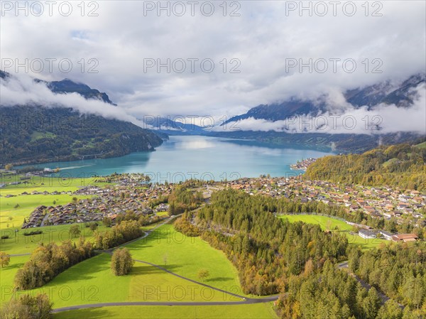 Aerial view of a village on a lake surrounded by a mountain landscape, Lake Brienz, Switzerland,