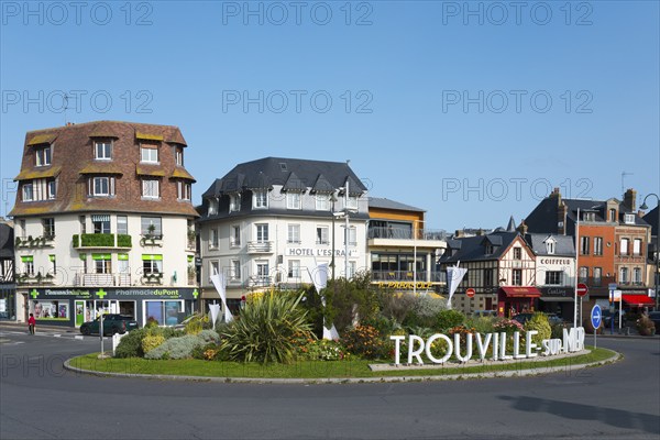 Roundabout in a town with various modern and historic buildings, Trouville-sur-Mer, Trouville, Cœur