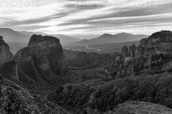 Sandstone formations, rock needles at sunset, backlight, monochrome, Meteora, Thessaly, Greece,