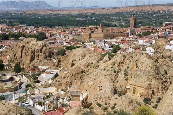 Traditional town embedded in a mountainous summer landscape under a blue sky, Alcazaba, Cathedral,