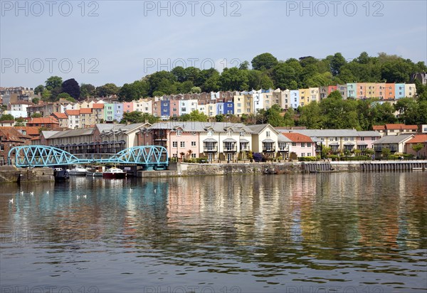 Colourful houses on hillside Clifton, Hotwells, from Floating Harbour, River Avon, Bristol,