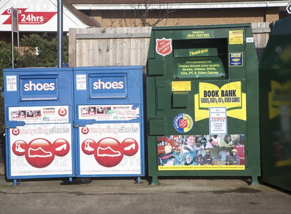 Shoe and Book Bank recycling collection containers at a Tesco store, UK