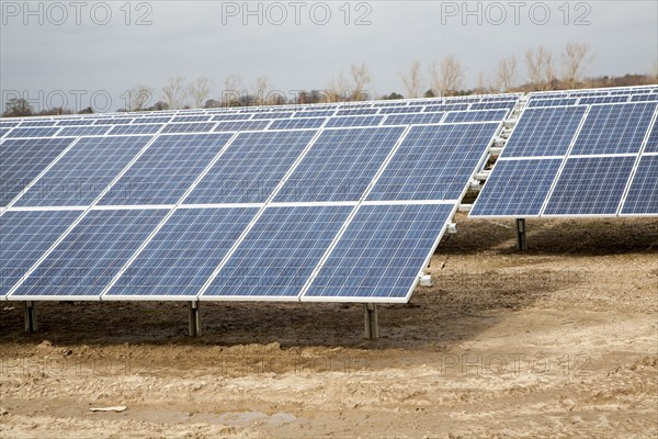 Solar array of photovoltaic panels in a large new solar park at Bucklesham, Suffolk, England,
