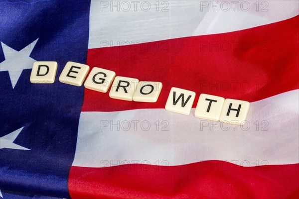 Symbolic image of degrowth: the anti-growth movement calls for a reduction in consumption and