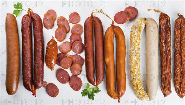 Food, meat products, various smoked sausages on a white surface AI generated, AI generated