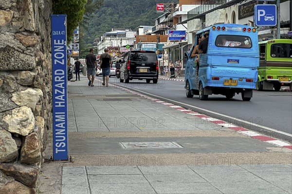 Tsunami Hazard Zone. Warning sign, signposting of escape routes in the event of another seaquake.