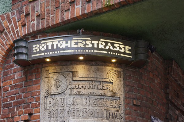 Artistic illuminated street sign Böttcherstrasse in Bremen, Hanseatic City, State of Bremen,