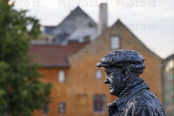 B&W Worker, sculpture by Jens Galschiøt, Børnehusbroen, Christianshavns Kanal, Copenhagen, Denmark,