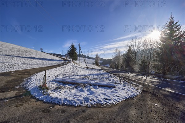 Hilly snowy landscape, roads, conifers, blue sky with veil clouds, Jostalstraße, Titisee-Neustadt,