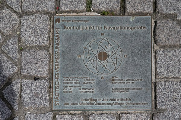 Checkpoint for navigation devices, metal plate lasered into the road, Villingen-Schwenningen,