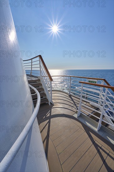 View from the deck of a cruise ship Mein Schiff 6 to the sunny sea and clear sky, North Sea,