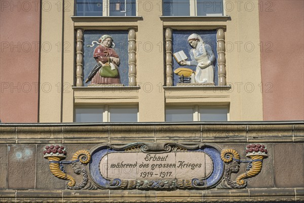 Midwives, relief on old building, former woman's and children's clinic, today St. Marien