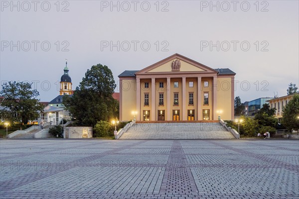 Platz der Deutschen Einheit with cultural centre. City view in the evening. Suhl, Thuringia,