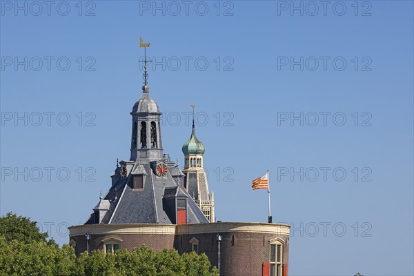 Historic old town of Enkhuizen, spires of the Drommedaris, former defence defence tower at the