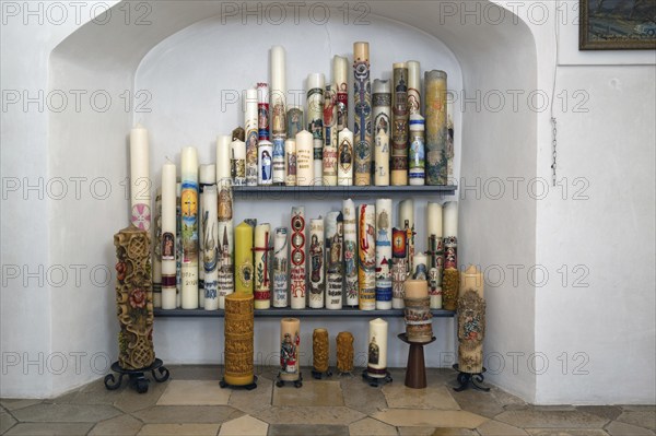 Sacrificial candles offered for sale in the pilgrimage basilica Maria Brünnlein, Wemding, Swabia