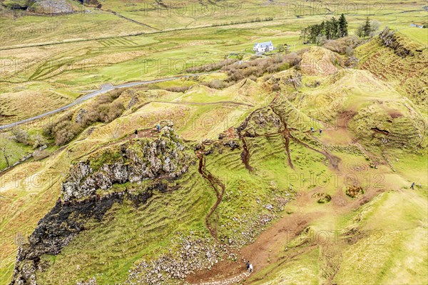 Aerial view of castle Ewen, a rock formation looking like a castle, Fairy Glen, Isle of Skye,