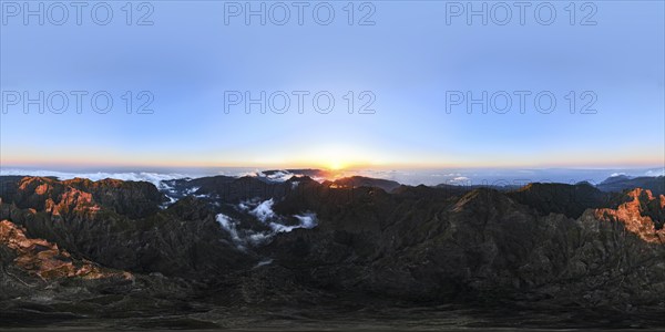360 panorama of aerial drone view of mountains over clouds near Pico Ruivo on sunset. Madeira