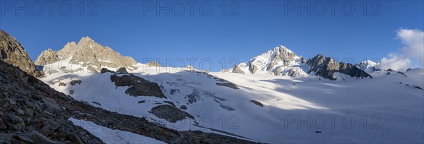 Panorama high alpine mountain landscape, summit of Aiguille de Chardonnet and Aiguille de Tour,