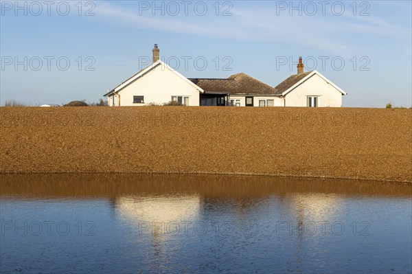 The Beacons bungalow house on beach at Shingle Street, Hollesley Bay, Suffolk, England, UK