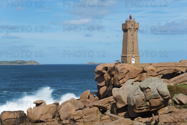 Lighthouse on a rocky shore with breaking waves, Phare de Men Ruz, Ploumanac'h, Ploumanach, Pointe