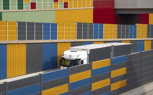 Colourful noise barriers on the A52 motorway, at the Essen-Rüttenscheid junction, the noise