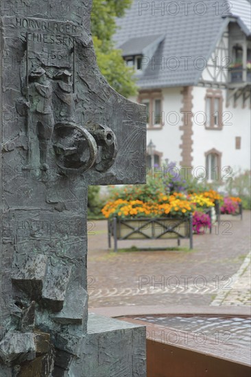 Fountain with sculpture of the Hornberg shooting, cannon, bronze, historical and famous saying,