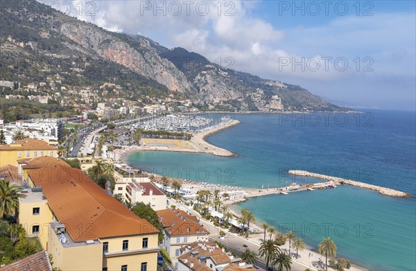 Scenic panoramic view of Menton seashore promenade and historic city in French Riviera Cote D azur