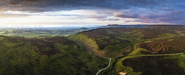 Panorama of Sunset over Cod Beck Reservoir from a drone, North York Moors National Park, North