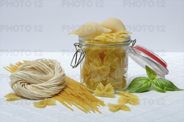 Various types of pasta with glass container, pasta varieties