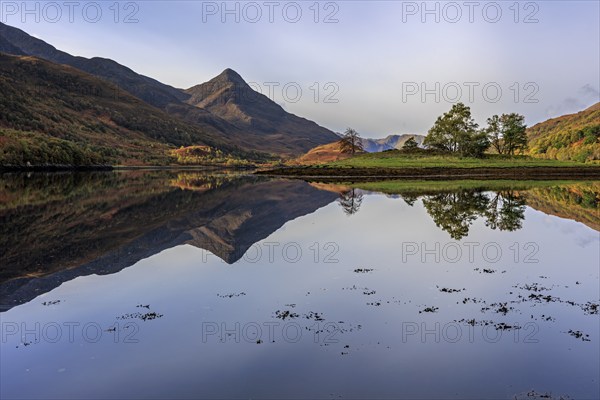 Mountains reflected in fjord, midday light, sunny, still, coast, sea, autumn, autumn colours, Loch