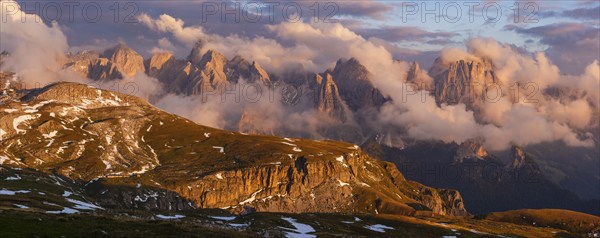 Panorama shot, rose garden group in clouds at evening light, Schlern, Dolomites, South Tyrol,