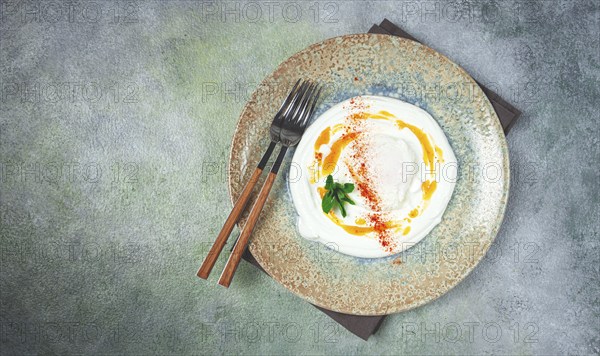 ?ilbir, traditional Turkish breakfast, Turkish eggs with yogurt and butter, homemade, no people